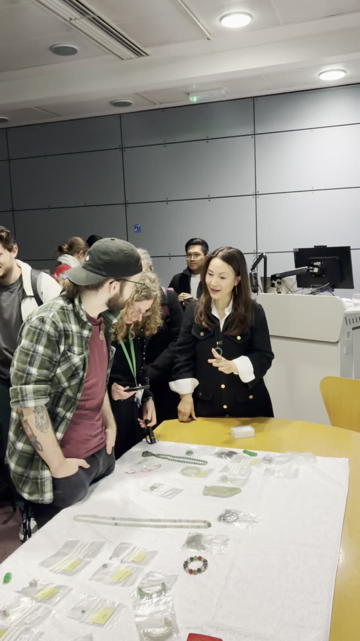 Candid moment of Kehan Li smiling with a student during the workshop.